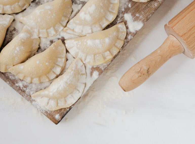 Illustrative picture of Polish dumplings on a cutting board