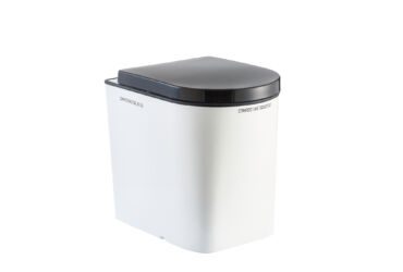 composting separating toilet with black toilet desk
