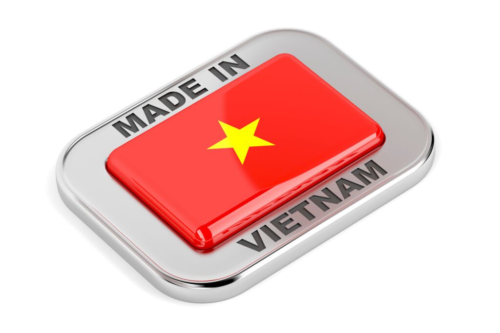 Przycisk z napisem "Made in Vietnam" i flagą Wietnamu