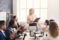 A group of employees at a meeting