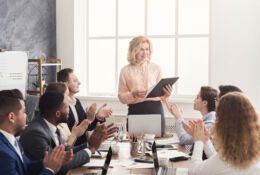 A group of employees at a meeting