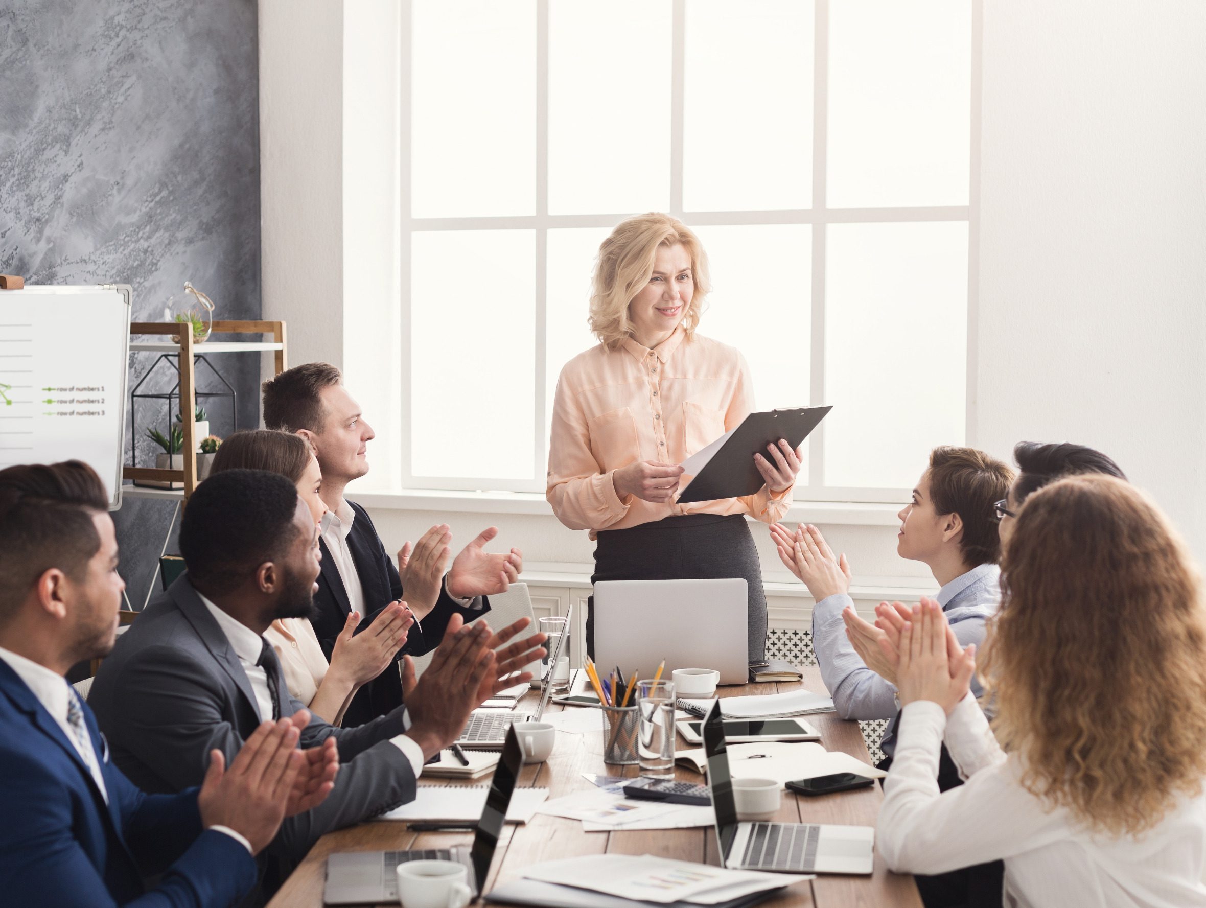 A group of employees at a meeting