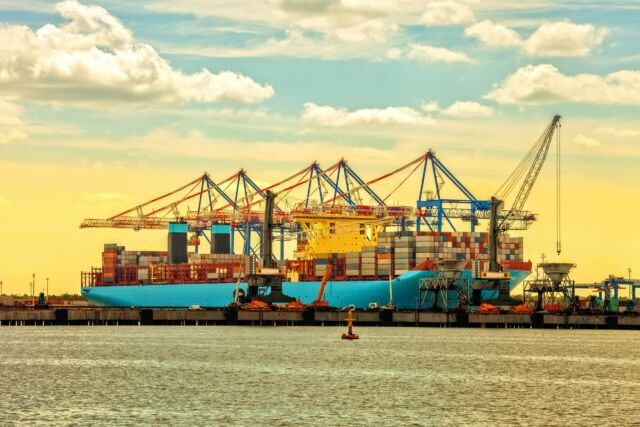 Container ship at sunset in Port of Gdansk, Poland.