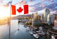 Flaga Kanady wieżowców na brzegu rzeki
