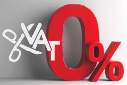 Grafika z czerwoną cyfrą )% i białymi nożycami z napisem VAT