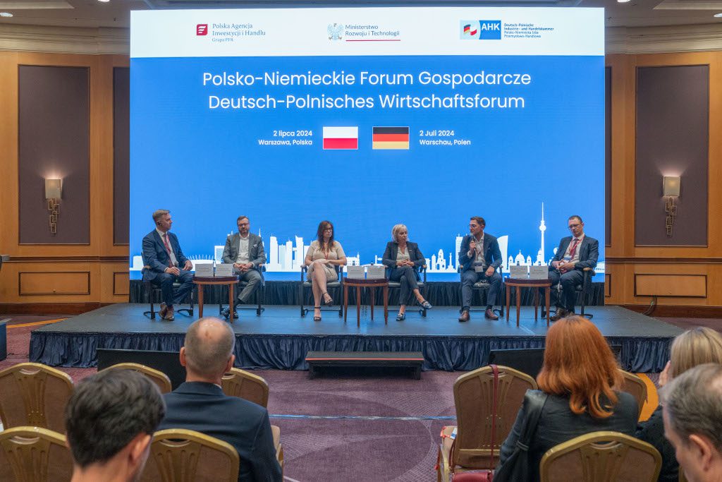 On-stage panel discussion with five panellists
