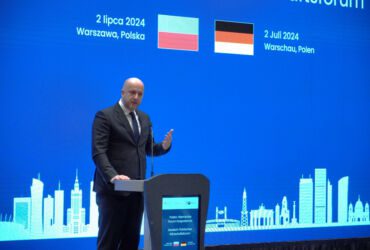 PAIH President Andrzej Dycha speaking from the stage