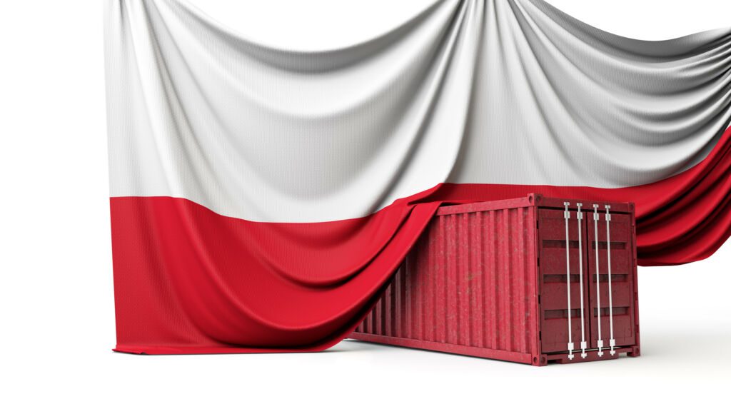 Flaga Polski rozwieszona nad kontenerem handlowym