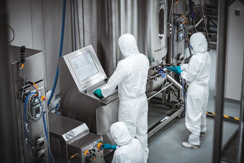 Mabion Manufacturing services: cGMP production team operating large-scale bioreactors under strict process control.