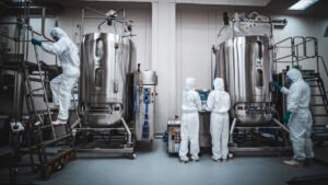 Mabion cGMP team operating Cytiva XDR-2000 bioreactors for large-scale mammalian drug substance manufacturing.