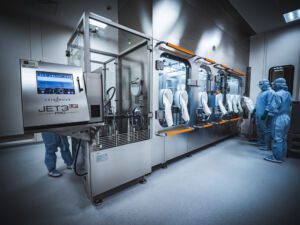 Mabion cGMP automatic aseptic filling line for biologics: automated vial fill-finish with integrated coding and control.