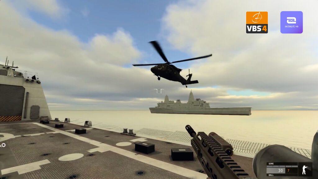 The photo depicts a VBS training simulation – featuring a weapon and a helicopter