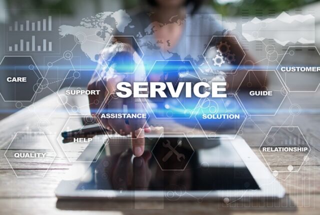 laptop, mapa swiata i napis service