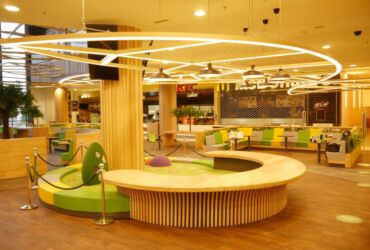 Food court zone made form solid beech wood, Ogrody Mall Elbląg, Poland