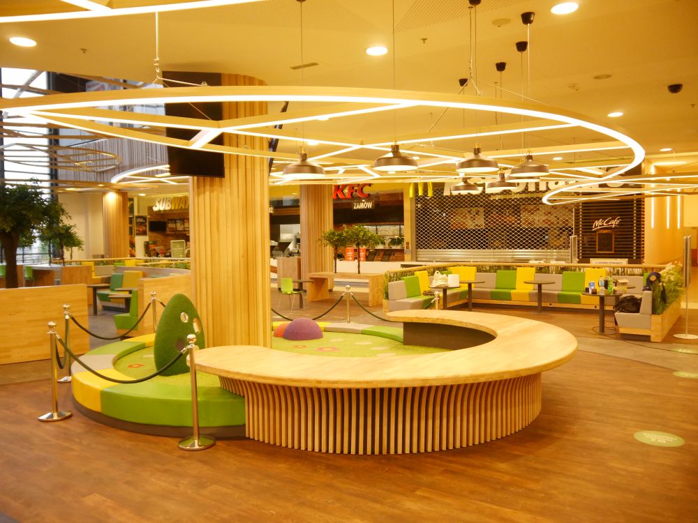 Food court zone made form solid beech wood, Ogrody Mall Elbląg, Poland