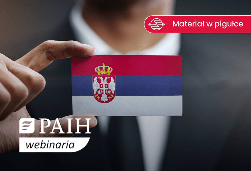 biznesmet trzymający kartę flafi Serbii